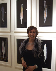 Feathers: Zabel Belian posed with Feather Art by Georg Vihos